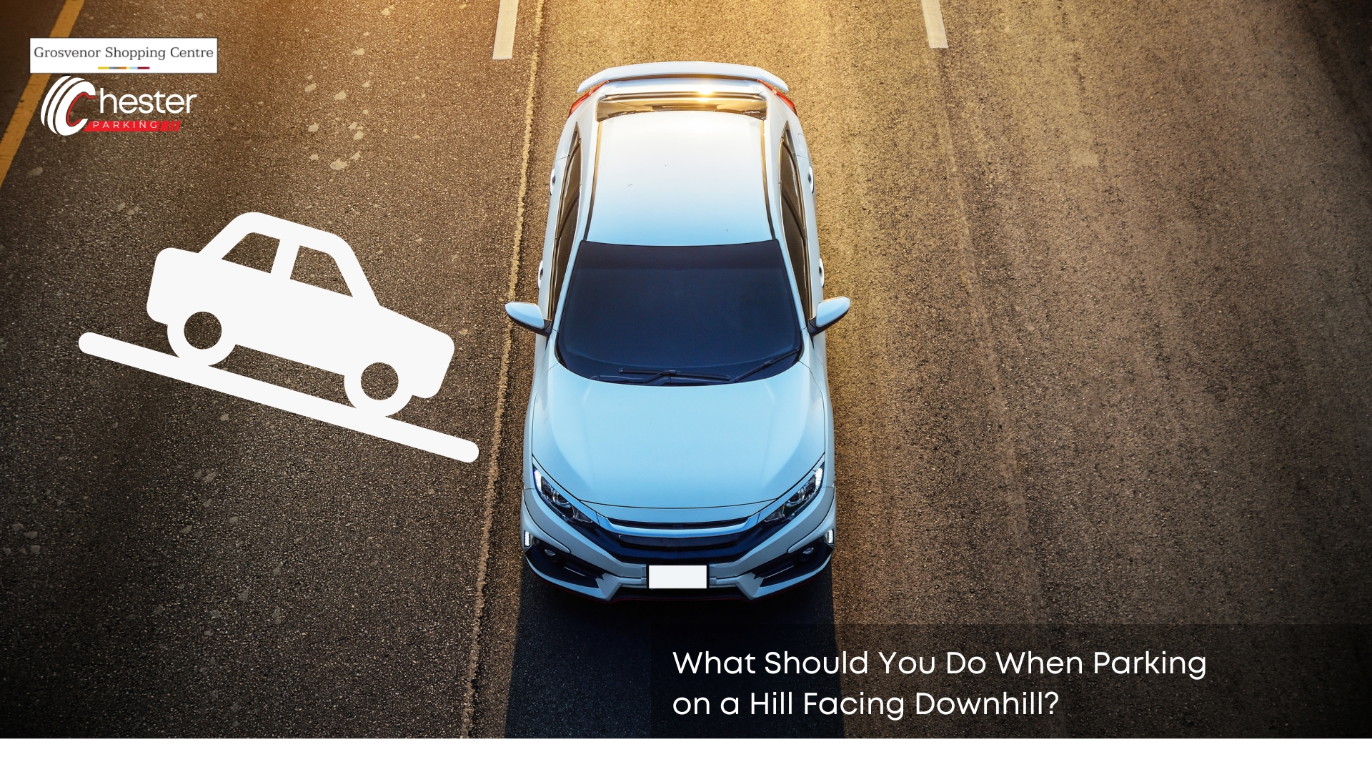 what should you do when parking on a hill facing downhill
